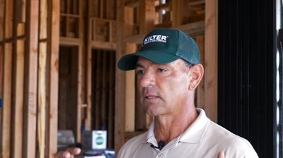 Greg McKendall Explaining Kilter Termite and Pest Control's Preventative Treatments Photo